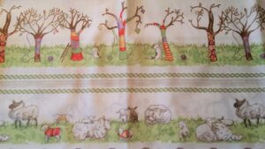 5.Tyg Stickad konst på träd, får och lamm